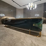 Refined Deep Green Textured TV Stand with Marble Top, Gold Metal Base and Concealed Storage Compartments